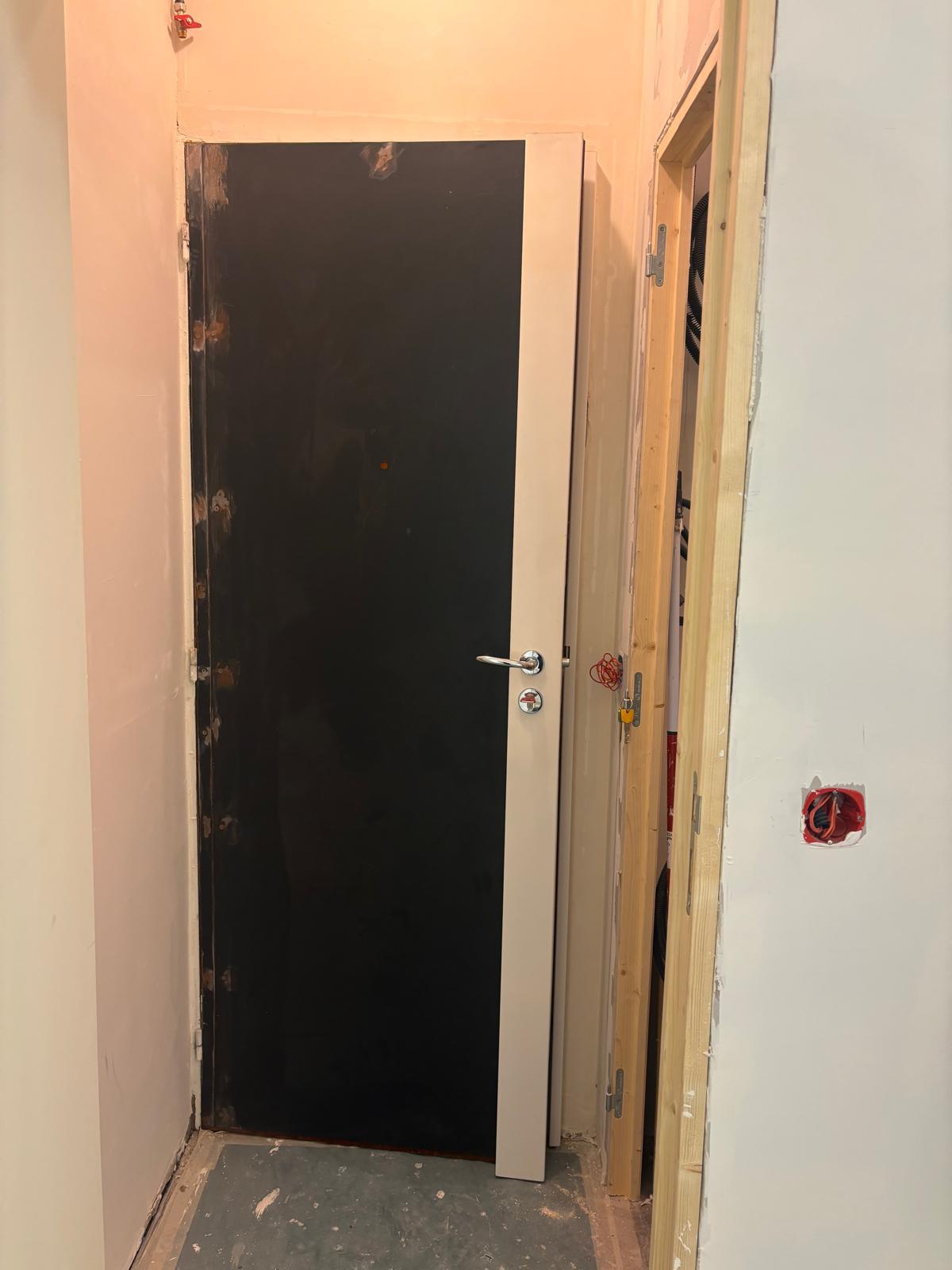 Porte capitonnée – remplacement de cylindre